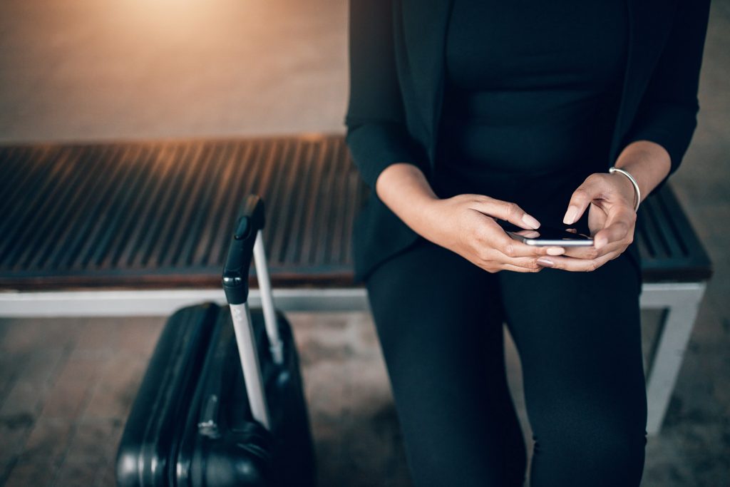 Woman Deciding if She Wants to Use Ride Share