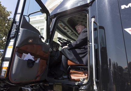 President Donald Trump Sits with Semi