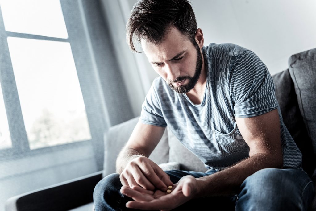 Man Suffering Through Opioid Crisis Contemplates Taking More Pills