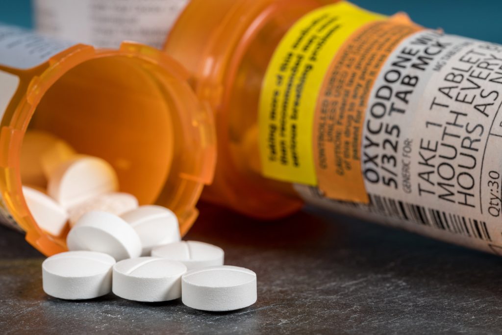 Opioid Pills Spill Out of Prescription Bottle