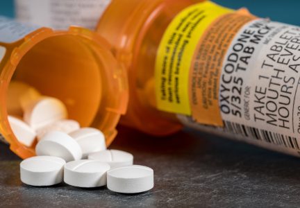 Opioid Pills Spill Out of Prescription Bottle