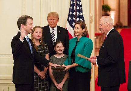 President Donald J. Trump looks on as Anthony M. Kennedy, retired Associate Justice of the Supreme Court of the United States, swears in Judge Brett M. Kavanaugh to be the Supreme Court's 114th justice.